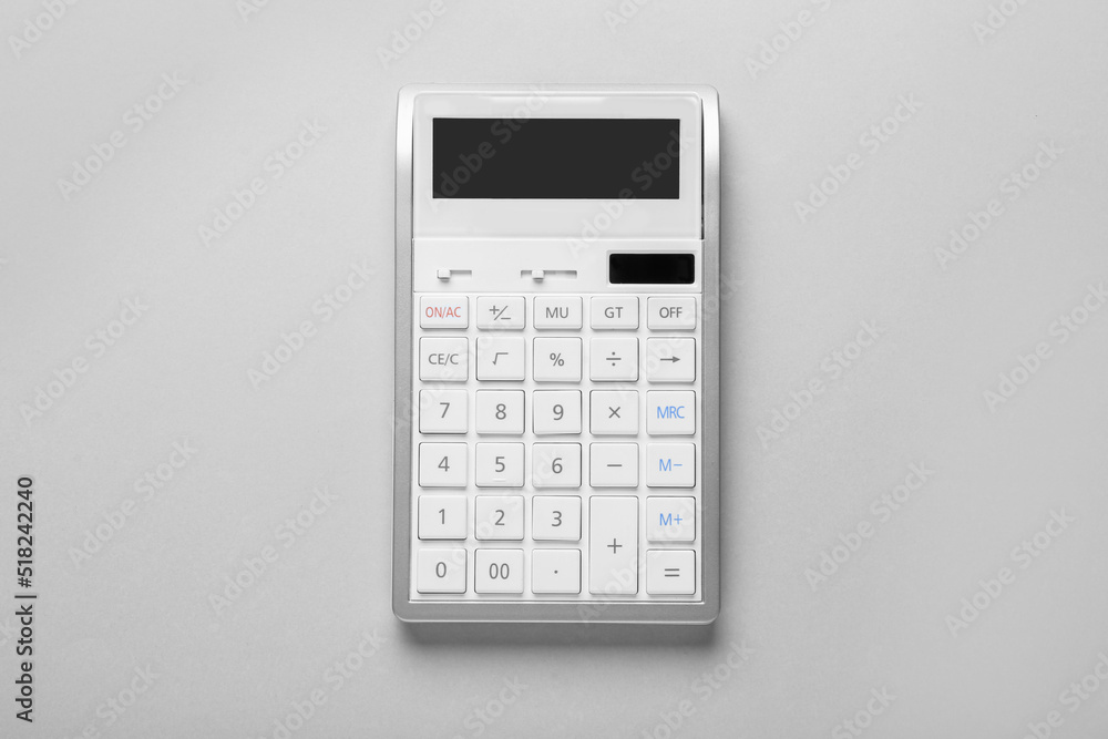 White calculator on light background, top view White calculator on light background, top view