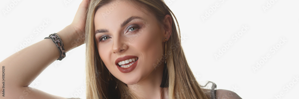 Beautiful stylish young blonde woman posing on white background in studio Beautiful stylish young blonde woman posing on white background in studio