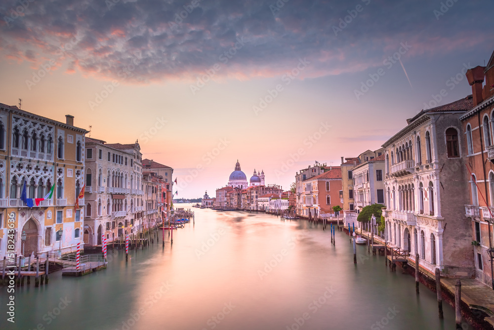 Grand Canal of Venice with blurred movement at sunrise, Italy