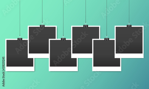 Blank black photo frame with black binding clip hanger. Vector illustration