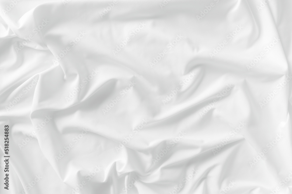 White fabric. luxurious white fabric texture background. Creases of satin, silk, and cotton. White fabric. luxurious white fabric texture background. Creases of satin, silk, and cotton.