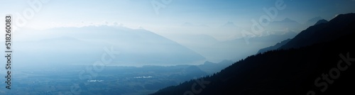 view from Gurnigel towards Thun and Lake Thun in bright morning light © schame87