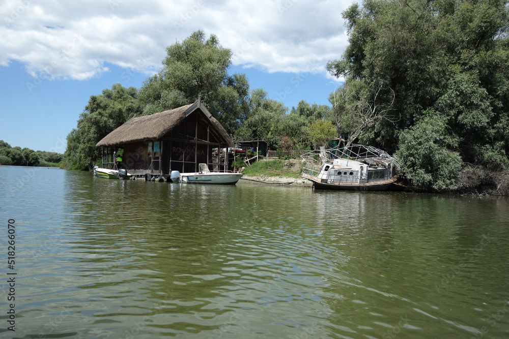 floating wood house in danube delta which belonged to late ivan patzaichin, caiac canoe world champion floating wood house in danube delta which belonged to late ivan patzaichin, caiac canoe world champion