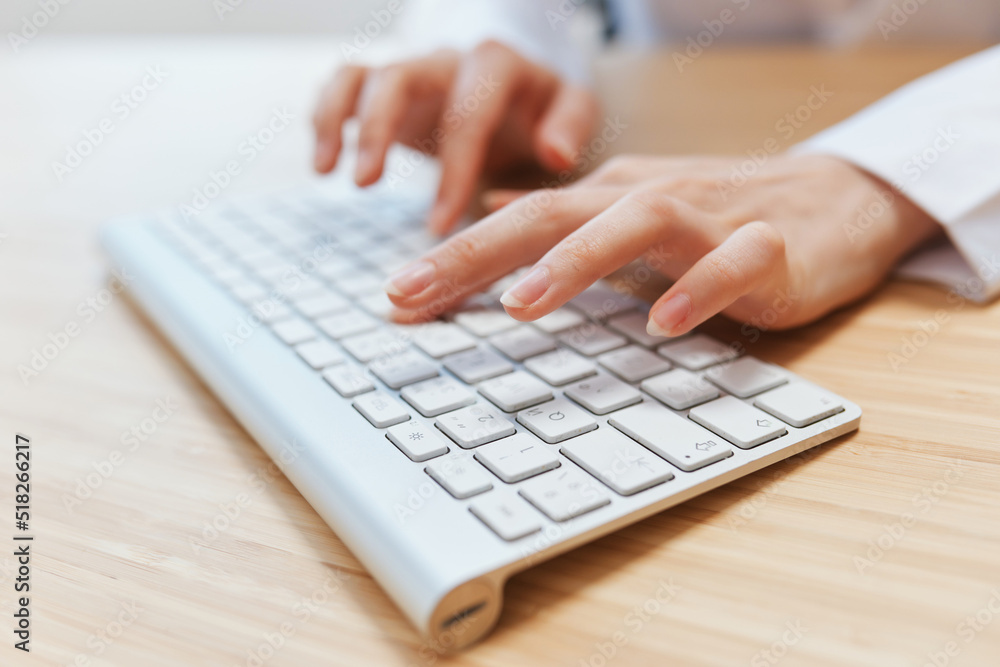 Closeup shot hands of businesswoman journalist office worker freelancer typing report doing documents on keyboard. Online communication, Remote job or Education. Copy space, wide angle Closeup shot hands of businesswoman journalist office worker freelancer typing report doing documents on keyboard. Online communication, Remote job or Education. Copy space, wide angle