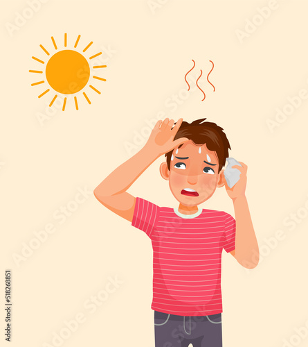 handsome young man suffering from heat wave stoke in very hot weather temperature because of global climate change