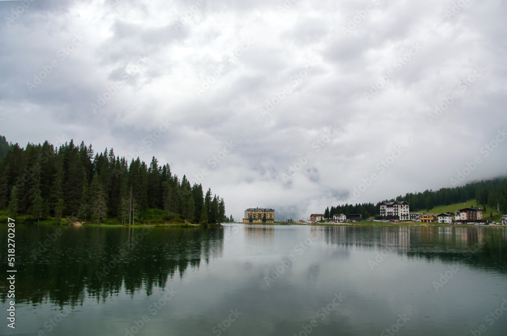 Lake Misurina freshly rained and low clouds on the Tre Cime di Lavaredo peaks is different.