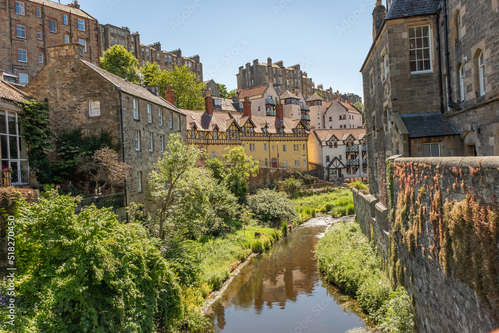 Edinburgh, Scotland, UK – June 20 2022. Period waterside properties on the bank of the Water of Leith