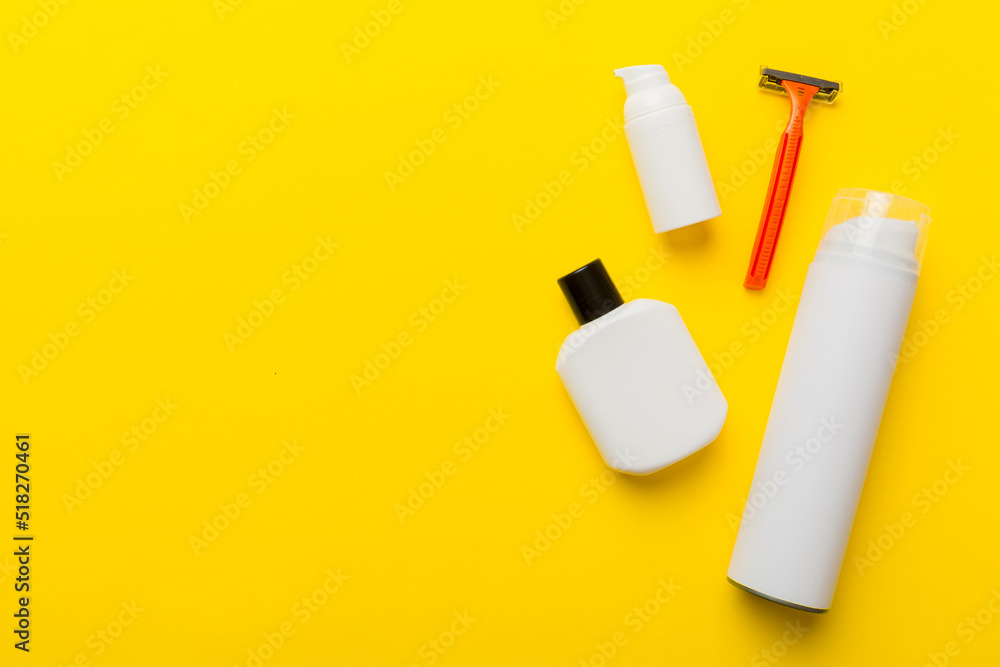 shaving man set. shaving machine, towel, lotion and shaving foam on colored background. Men bath Accessories top view shaving man set. shaving machine, towel, lotion and shaving foam on colored background. Men bath Accessories top view