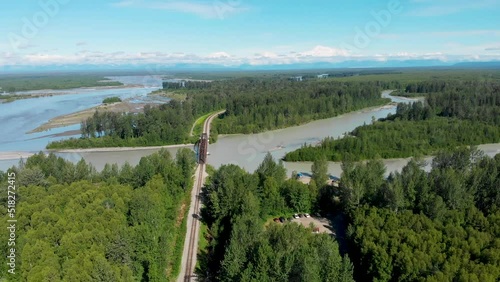 4K Drone Video of Alaska Railroad Train Trestle with Mt. Denali in Distance during Summer photo