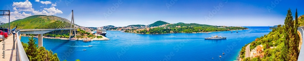 Coastal summer landscape - view of Dubrovnik from the side of The Franjo Tudman Bridge, overlooking the port of Gruz and the Lapad peninsula on the Adriatic coast of Croatia