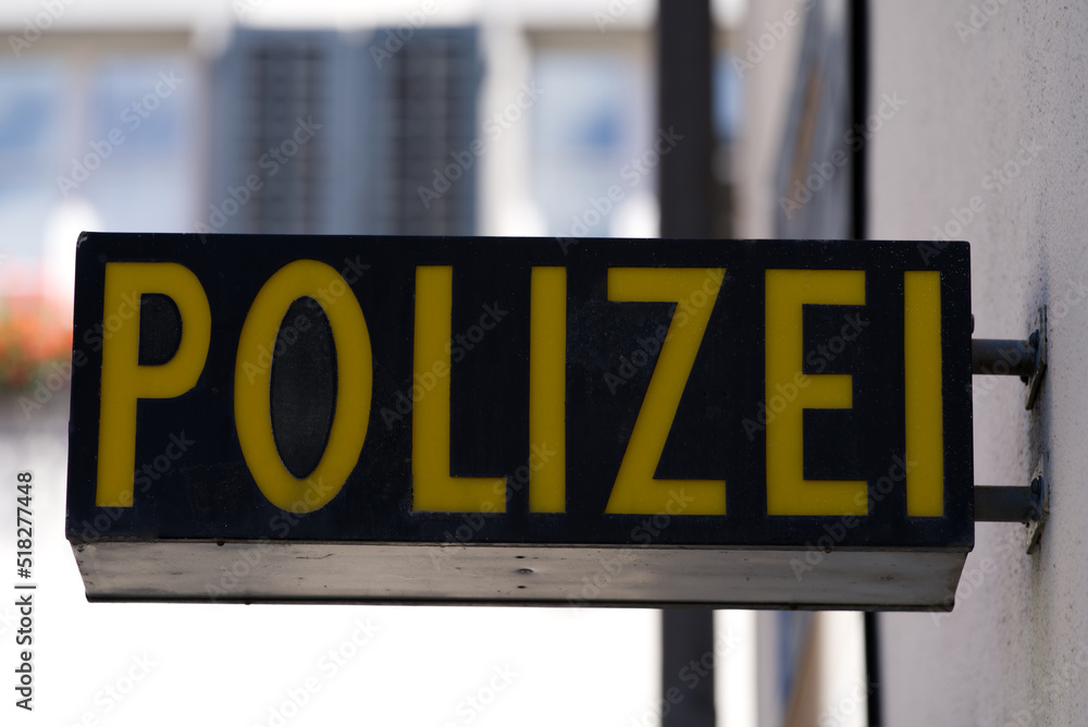 Close-up of black and yellow police (German Polizei) sign at police station at City of Altdorf, Canton Uri, on a sunny summer day. Photo taken June 25th, 2022, Altdorf, Switzerland. Close-up of black and yellow police (German Polizei) sign at police station at City of Altdorf, Canton Uri, on a sunny summer day. Photo taken June 25th, 2022, Altdorf, Switzerland.