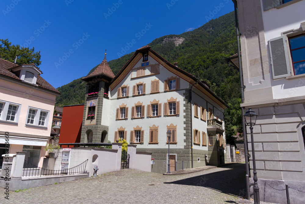 Town Hall Square at City of Altdorf, Canton Uri, with historic houses on a sunny summer day. Photo taken June 25th, 2022, Altdorf, Switzerland.