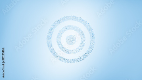 Sign target printed on the wet glass on blue background | skin care concept