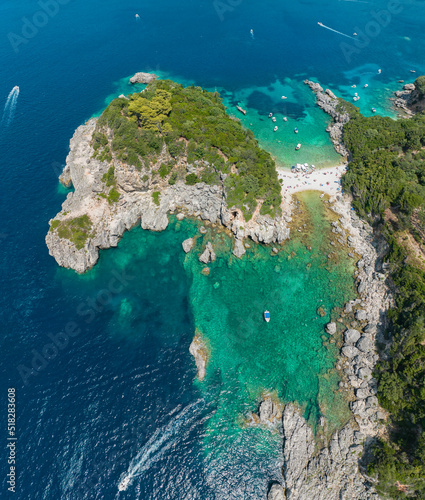 Aerial view of Limni Beach Glyko, on the island of Corfu. Greece. Where the two beaches are connected to the mainland providing a wonderful scenery. Unique double beach. Kerkyra