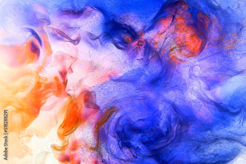 Liquid fluid art abstract background. Orange blue acrylic paint underwater, galactic smoke ocean