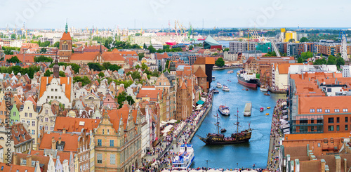 Tourist destination of Gdansk, old buildings in downtown by Motlawa river, aerial panoramic landscape
