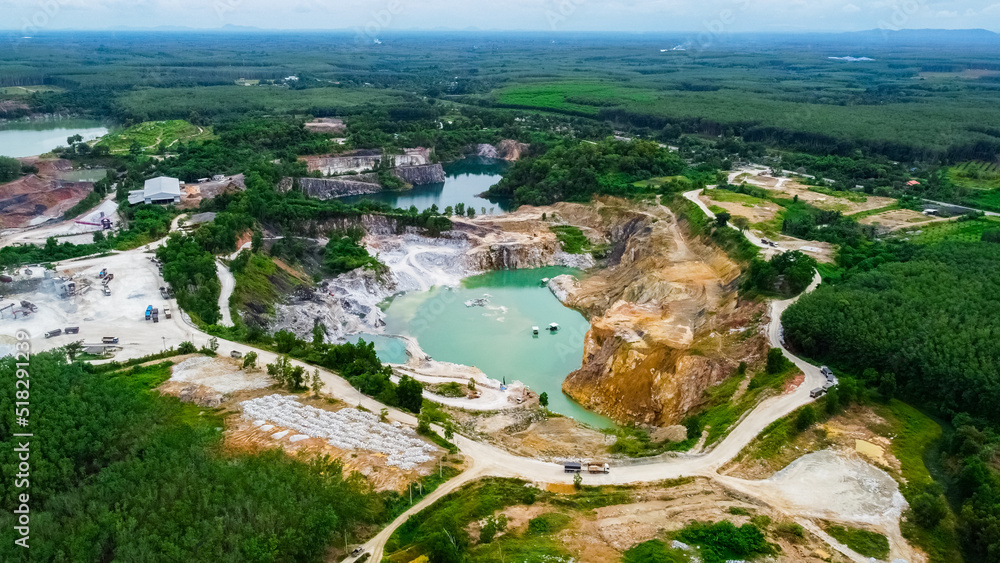 aerial photograph of a large pit of a gypsum mine. A large gypsum mine. Mining and Geology Industry Concepts