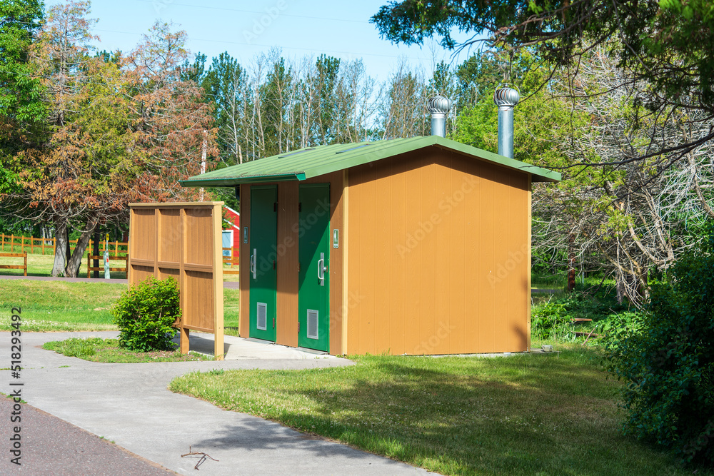 Rural public restroom facility located at a roadside park Rural public restroom facility located at a roadside park