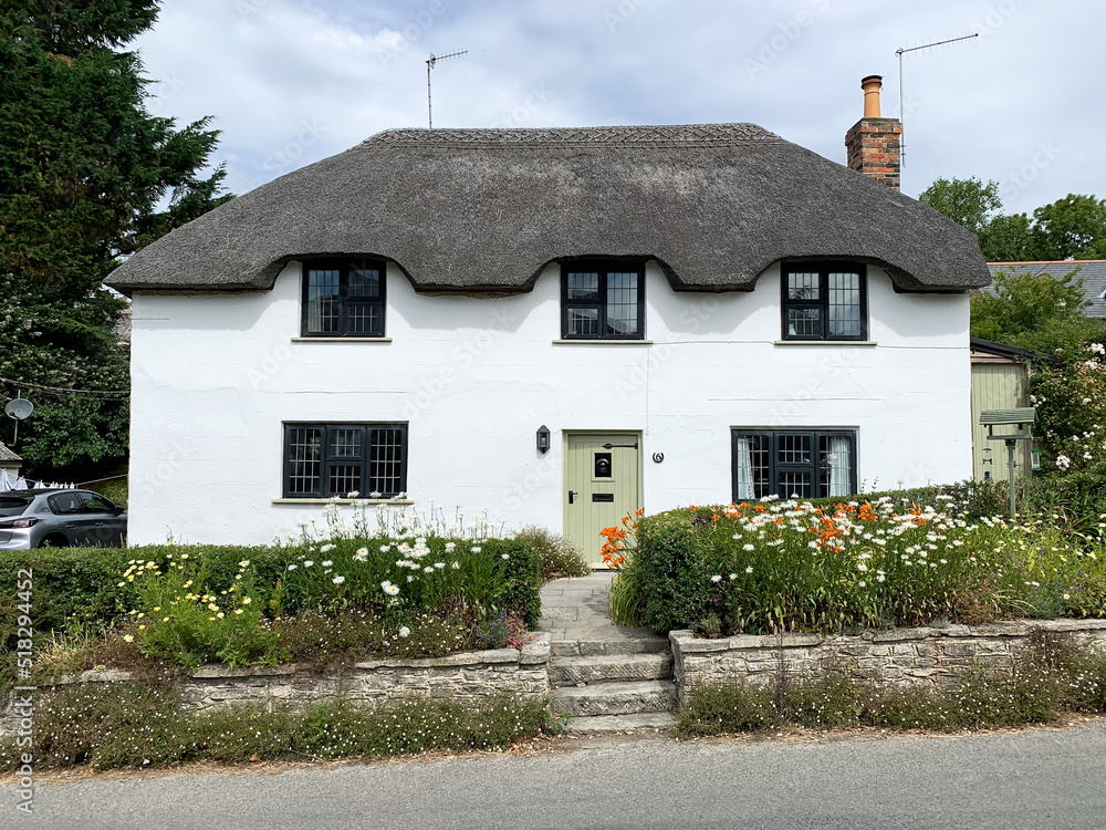 Old cottage in Church Knowle, Dorset, UK. Street view of the village