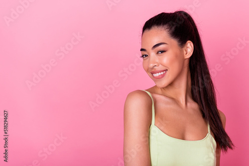 Portrait of nice lovely lady look in camera bite teeth lips enjoy summer time isolated on pastel color background