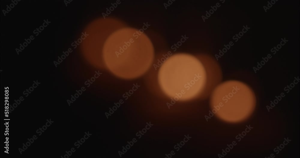 Blurred candle lights in the middle of the night Blurred candle lights in the middle of the night