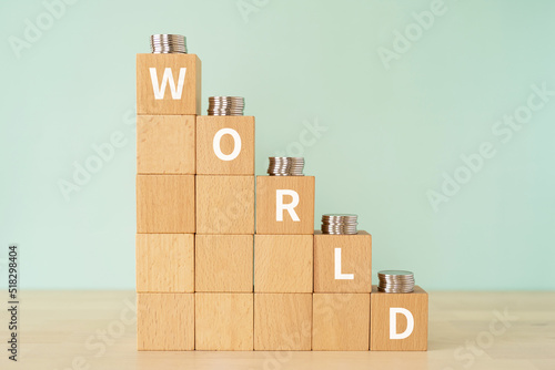 「WORLD」と書かれたブロックとコイン 