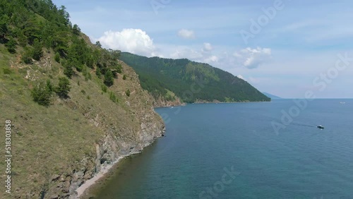 Wallpaper Mural Flight over Lake Baikal. Drone video 4k footage. Lake and green forest on the shore. Landscape. Coastline. Torontodigital.ca