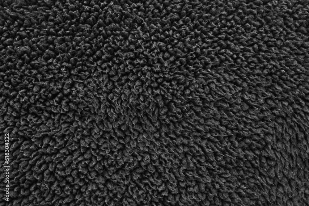 Faux fur black wool abstract pattern nature skin soft warm fluffy background dark artifical texture Faux fur black wool abstract pattern nature skin soft warm fluffy background dark artifical texture