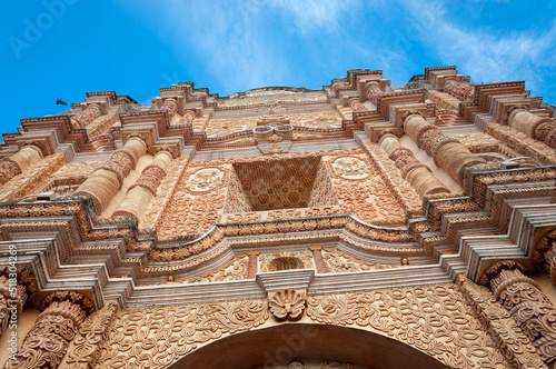 Facade detail at Santo Domingo Church, a Dominican Convent in San Cristobal de las Casas, Mexico. The monastery is one of the most ornate in Latin America, due to the stucco work on the main facade.
