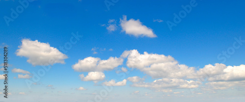 Blue sky with light clouds. Wide photo.
