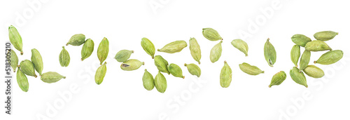 Dried green cardamom seeds isolated on a white background  top view. Cardamom pods.