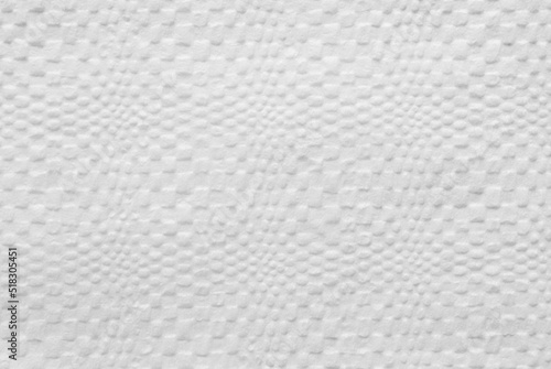A sheet of clean white tissue paper as background