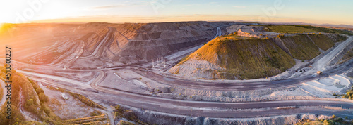 aerial panorama view of open cut coal mine at dusk photo
