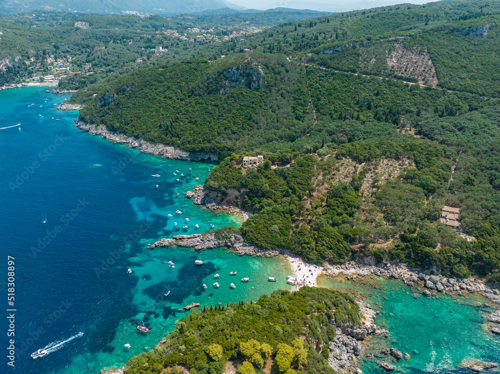Aerial view of Limni Beach Glyko, on the island of Corfu. Greece. Where the two beaches are connected to the mainland providing a wonderful scenery. Unique double beach. Kerkyra
