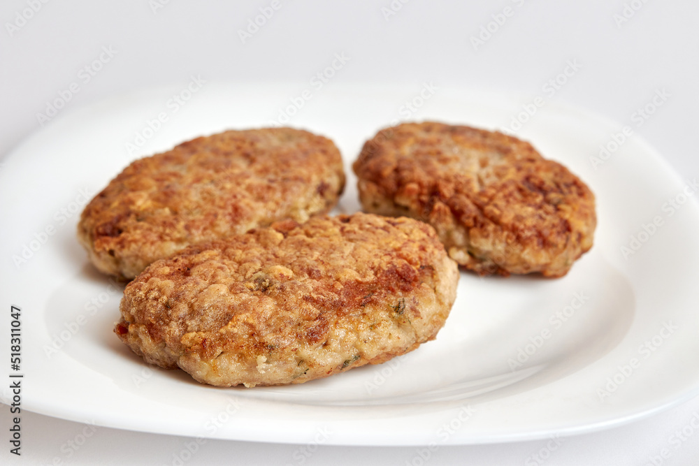 Fried meatballs on a white plate. Fried meatballs on a white plate.