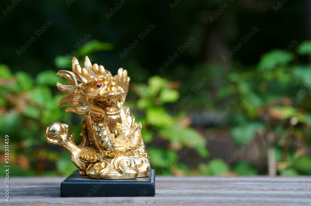 Chinese dragon figurine closeup. The symbol of Feng shui. A symbol of