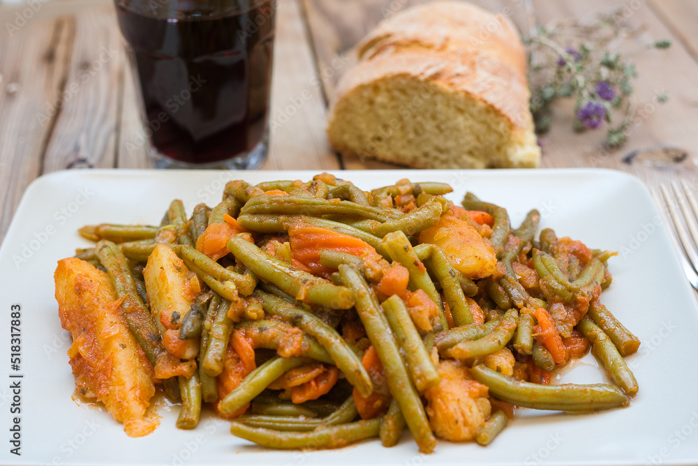 traditional Greek food, green beans, onion and potatoes stewed in