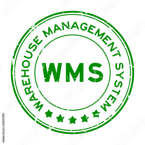 Grunge green WMS warehouse management system word round rubber seal stamp on white background