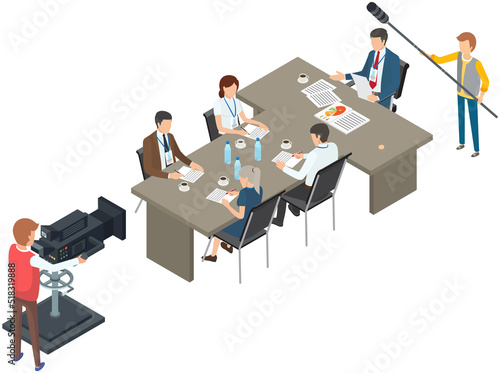 Filming television news program scene with business people at table at meeting. Presenter journalist interviewing guests at studio, cameraman recording video. Journalism, mass media and press concept