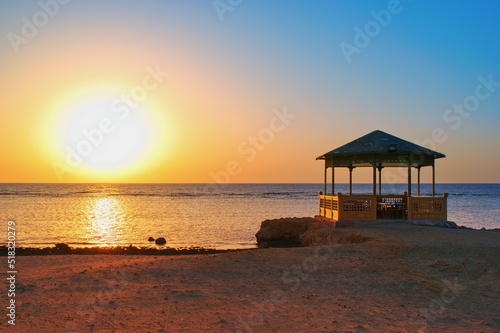 Idylic beach with gazebo within sunrise, Marsa Alam , Red Sea, Egypt