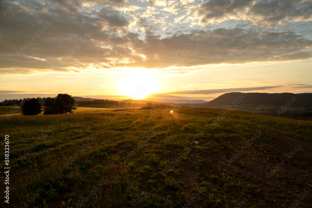 Landscape of beautiful sunset on a fields in Czech republic. Nature.