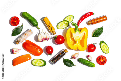 Assorted fresh vegetables and spices isolated on white background