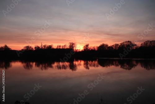 sunset on a lake © Martin