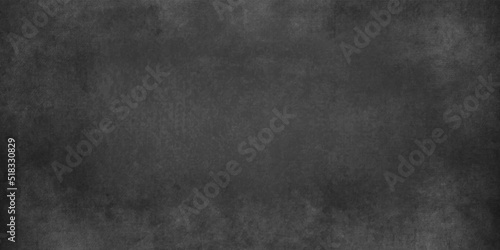 Vintage black stone concrete cement blackboard chalkboard wall floor texture. Black anthracite dark grey grunge old texture panorama backdrop background.