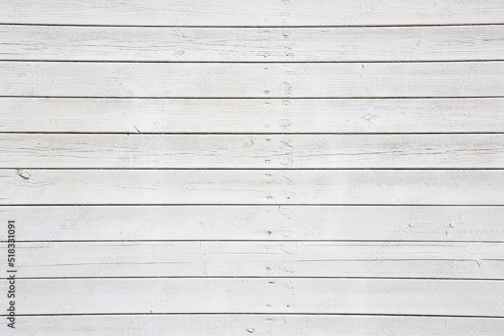 Obraz premium Old weathered white painted wooden slatted wall