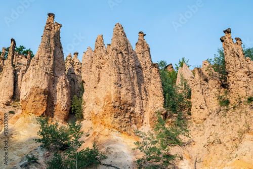 Devils Town is a rock formation consisting of about 200 earth pyramids or "towers" in Serbia, Djavolja varos in Serbia