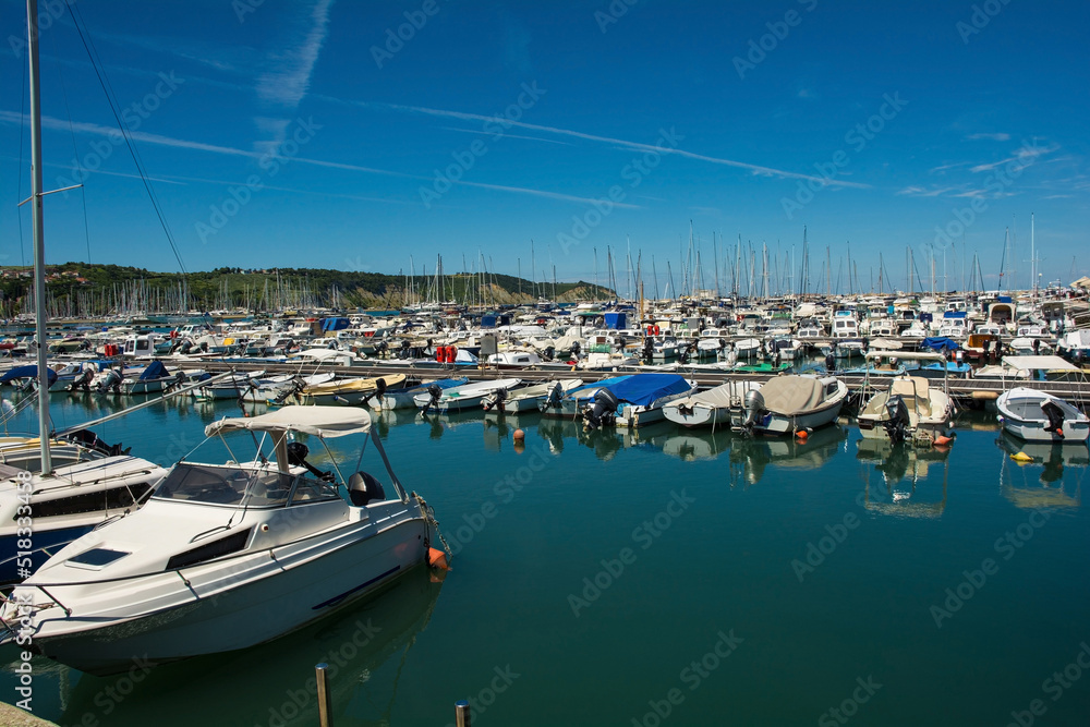 Obraz premium The marina of the historic medieval town of Izola on the Adriatic coast of Slovenia 