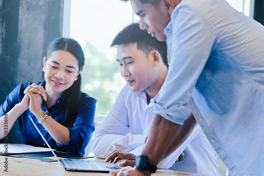 Fototapeta premium Young business people meeting Working together as a team for business startups.