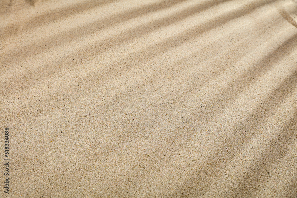Sand with free space and sun rays on a summer day with a free space Sand with free space and sun rays on a summer day with a free space