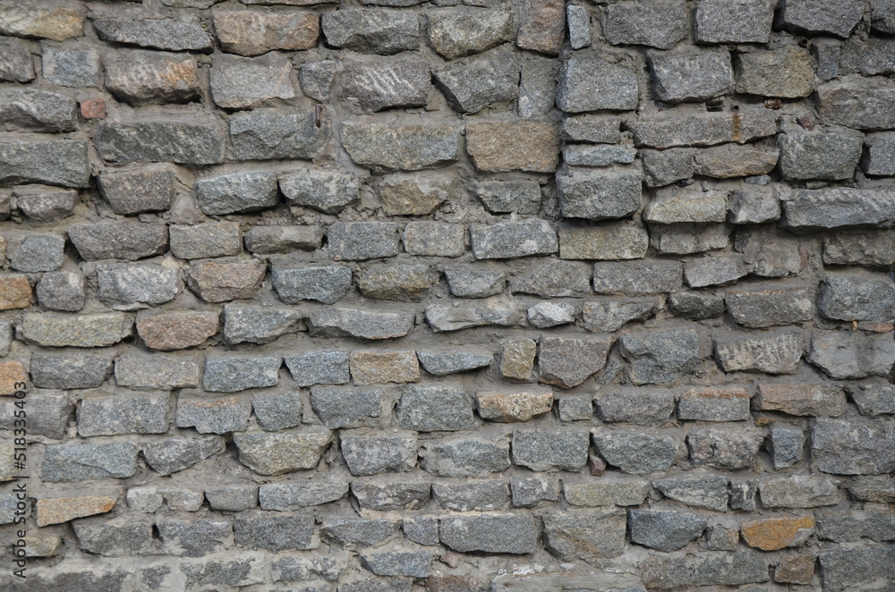 Background gray stone wall. Vertical photo